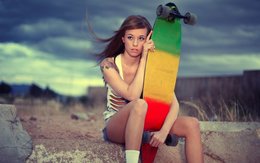 Sporty girl and skateboard 055628