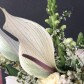 kalla-antirrinum-roza-ranunkulyus-eustoma-bukete
